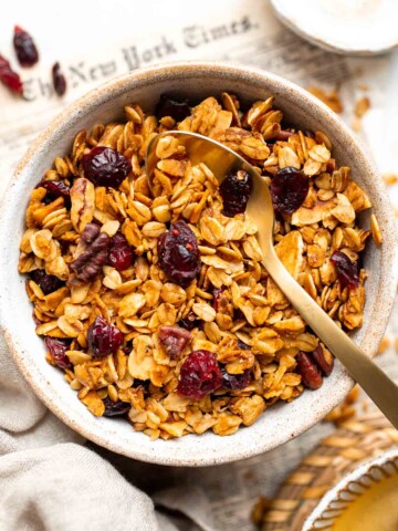 Homemade Granola is quick and easy to make at home using simple ingredients and 5 minutes of prep. This healthy snack is crunchy, delicious, and flavorful. | aheadofthyme.com