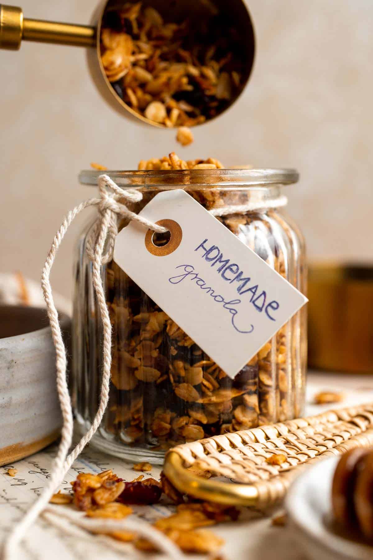 Homemade Granola is quick and easy to make at home using simple ingredients and 5 minutes of prep. This healthy snack is crunchy, delicious, and flavorful. | aheadofthyme.com