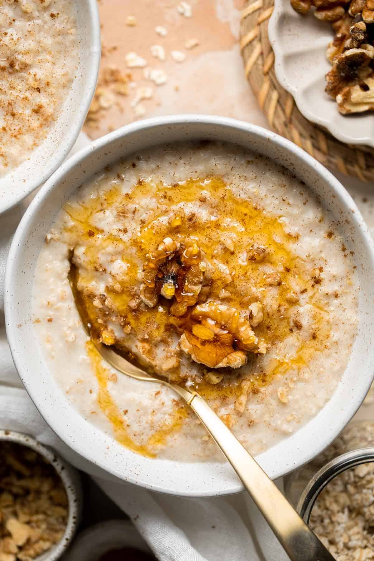 Oat Porridge is a healthy, delicious breakfast that's warm, comforting, cozy, and great for all ages. A quick easy recipe to warm you up on cold mornings. | aheadofthyme.com