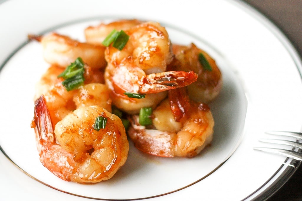 Quick and easy, pan-fried garlic prawns with soy sauce, garlic, and green onions is a simple but flavourful Chinese stir-fry made in under 15 minutes. | aheadofthyme.com