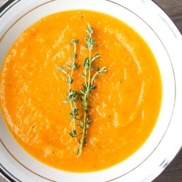 Roasted Butternut Squash Soup: This delicious roasted butternut squash soup sums up the taste of the holidays in one spoon. Rosemary, sage and thyme, need I say more? | aheadofthyme.com