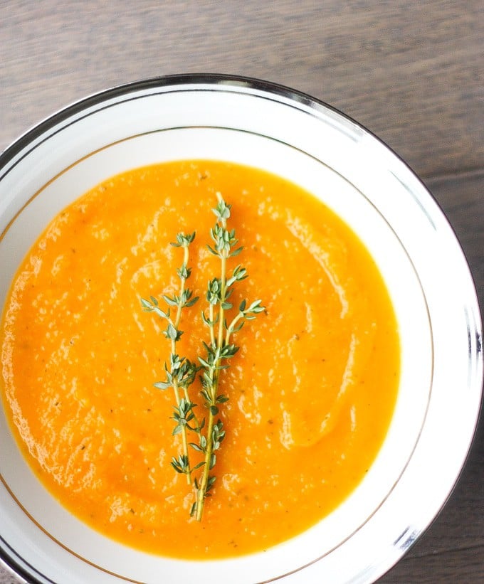 Roasted Butternut Squash Soup: This delicious roasted butternut squash soup sums up the taste of the holidays in one spoon. Rosemary, sage and thyme, need I say more? | aheadofthyme.com