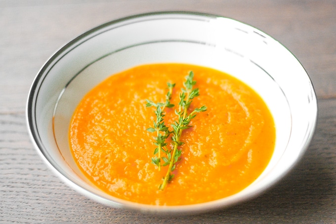 Roasted Butternut Squash Soup: This delicious roasted butternut squash soup sums up the taste of the holidays in one spoon. Rosemary, sage and thyme, need I say more? | aheadofthyme.com