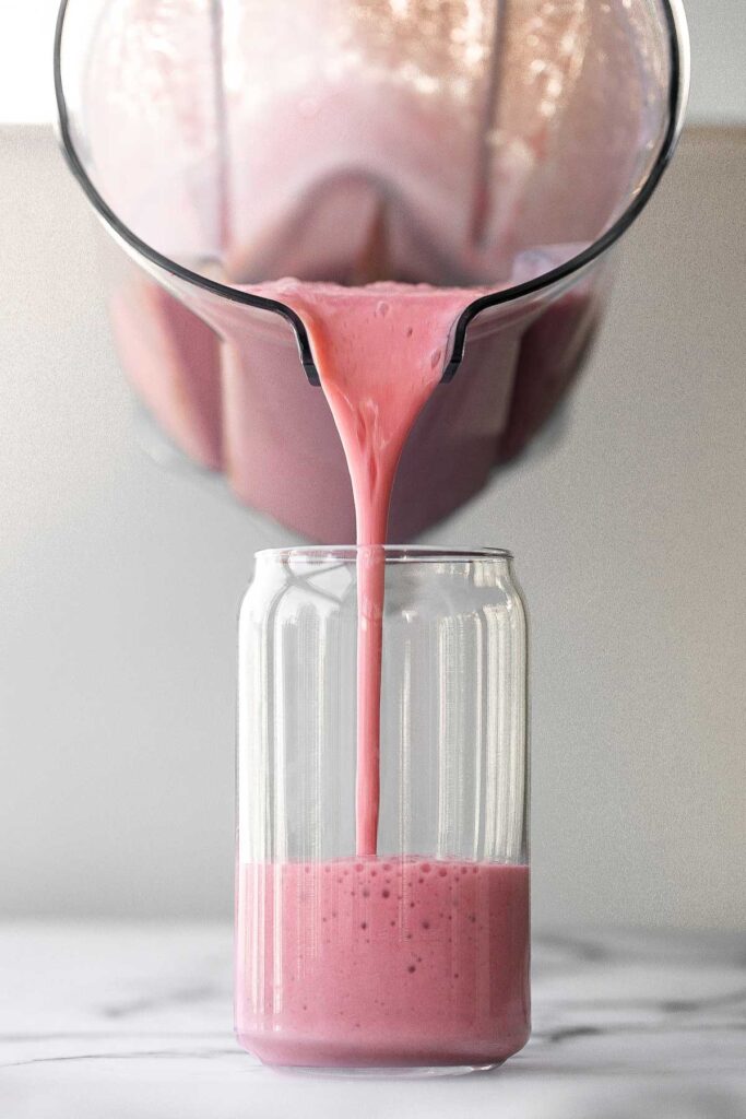 Quick and easy strawberry banana smoothie is the perfect breakfast on the go or refreshing snack. It's fruity, delicious, and packed with nutrients. | aheadofthyme.com