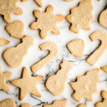 Sugar cookies are golden brown with crispy edges and soft and thick on the inside. They are buttery and sweet, easy to make in one bowl, and freeze well. | aheadofthyme.com