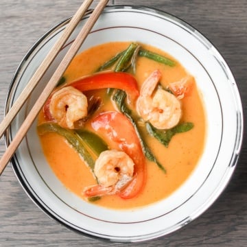 Better than takeout, Thai coconut red curry with prawns is easy, quick, and full of so much flavour! Cook this perfect weeknight dinner in just 15 minutes! | aheadofthyme.com