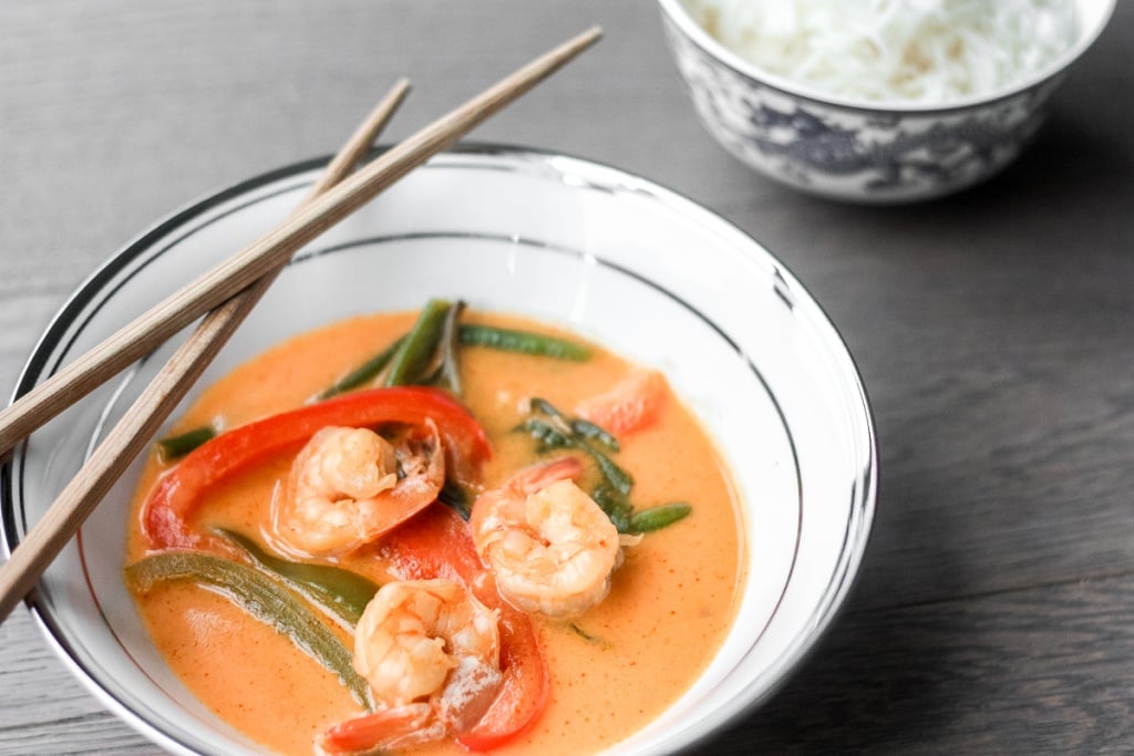 Better than takeout, Thai coconut red curry with prawns is easy, quick, and full of so much flavour! Cook this perfect weeknight dinner in just 15 minutes! | aheadofthyme.com