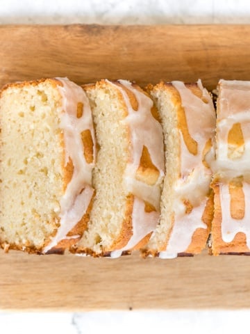 Inspired by Starbucks lemon loaf, this moist, homemade lemon loaf with lemon glaze has the perfect balance between sweet and tangy, and so so flavourful. | aheadofthyme.com