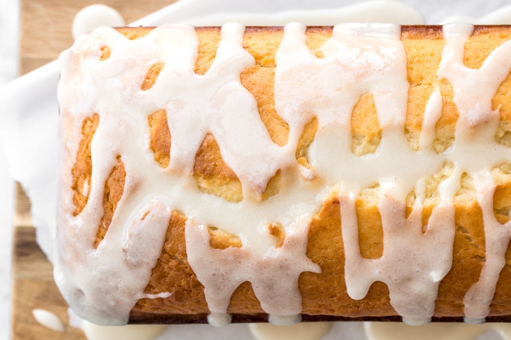 Inspired by Starbucks lemon loaf, this moist, homemade lemon loaf with lemon glaze has the perfect balance between sweet and tangy, and so so flavourful. | aheadofthyme.com