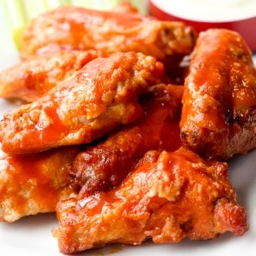 Is it even game day without game day buffalo hot wings? This classic appetizer is a total crowd pleaser and one of my most popular Super Bowl recipes. | aheadofthyme.com