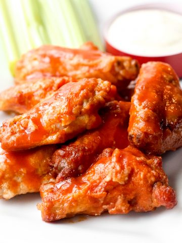 Is it even game day without game day buffalo hot wings? This classic appetizer is a total crowd pleaser and one of my most popular Super Bowl recipes. | aheadofthyme.com