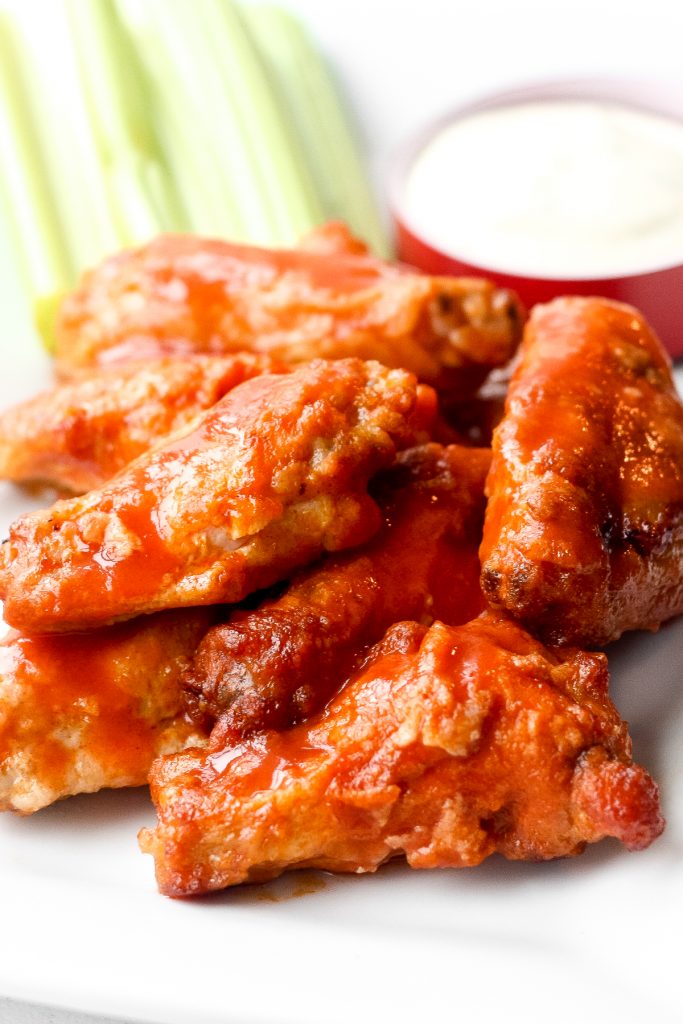 Is it even game day without game day buffalo hot wings? This classic appetizer is a total crowd pleaser and one of my most popular Super Bowl recipes. | aheadofthyme.com