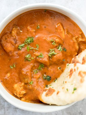 Better than takeout, make easy Indian butter chicken in just 30 minutes, with a creamy tomato-based sauce, charred chicken, and incredible spice + flavour. | aheadofthyme.com