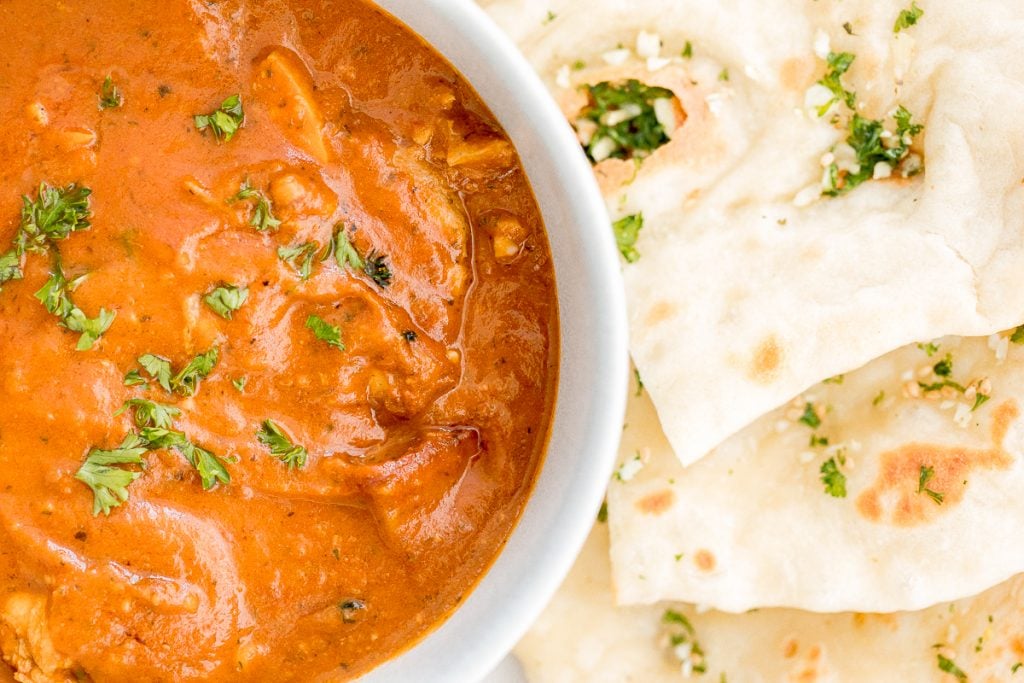 Better than takeout, make easy Indian butter chicken in just 30 minutes, with a creamy tomato-based sauce, charred chicken, and incredible spice + flavour. | aheadofthyme.com