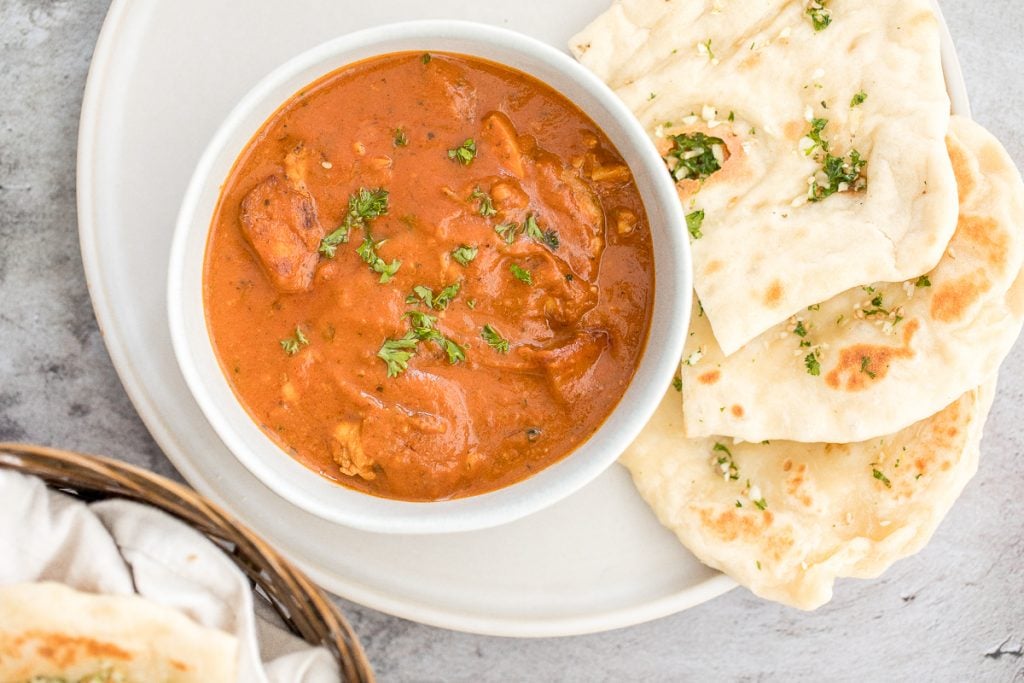 Better than takeout, make easy Indian butter chicken in just 30 minutes, with a creamy tomato-based sauce, charred chicken, and incredible spice + flavour. | aheadofthyme.com