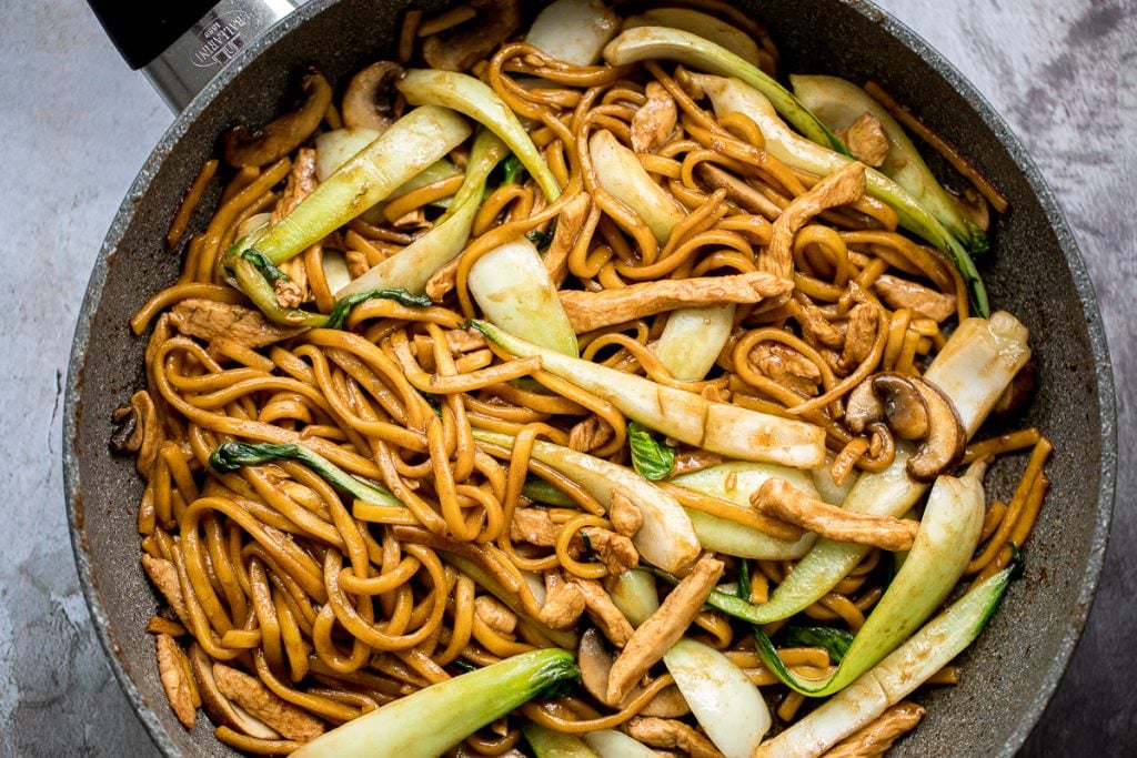 Better than take-out, flavourful and authentic Shanghai fried noodles with chicken, mushrooms, and bok choy is made in just 10 minutes - the easiest dinner! | aheadofthyme.com