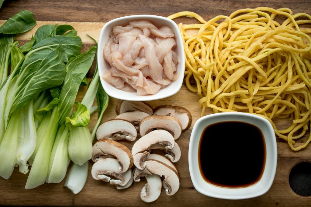 Better than take-out, flavourful and authentic Shanghai fried noodles with chicken, mushrooms, and bok choy is made in just 10 minutes - the easiest dinner! | aheadofthyme.com