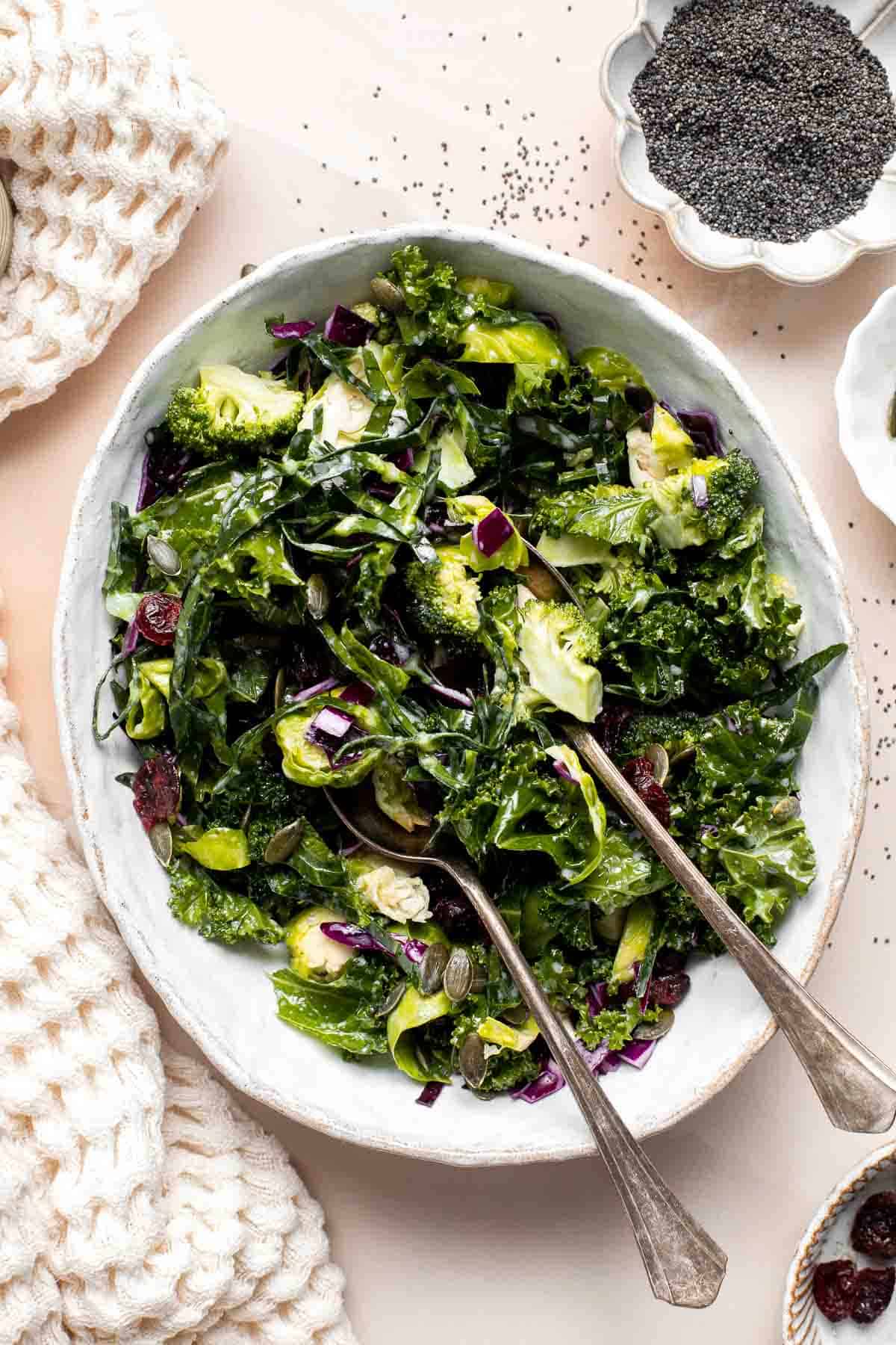 This Sweet Kale Salad is loaded with hearty greens, veggies, and homemade poppy seed dressing — inspired by the Taylor Farms salad kit from Costco. | aheadofthyme.com