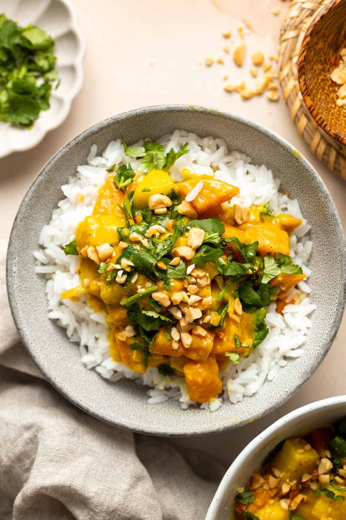 Sweet Potato Yellow Curry is a flavorful and delicious vegetarian dish that is quick and easy to make any day of the week in under 30 minutes. | aheadofthyme.com