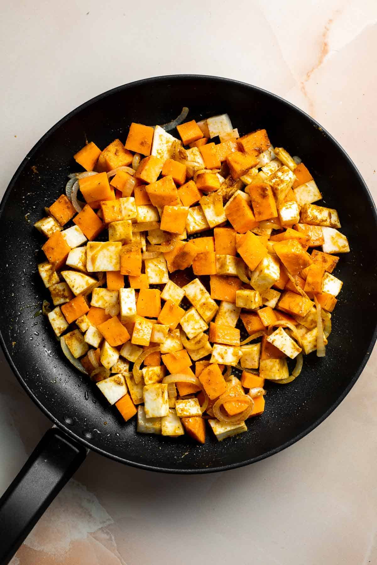 Sweet Potato Yellow Curry is a flavorful and delicious vegetarian dish that is quick and easy to make any day of the week in under 30 minutes. | aheadofthyme.com