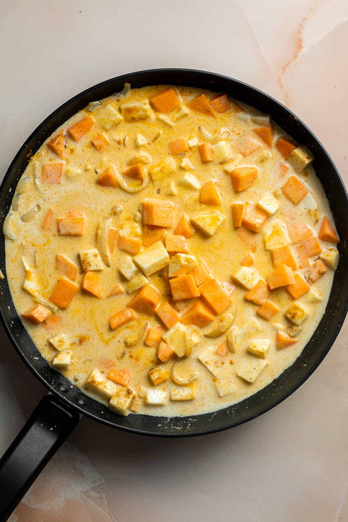 Sweet Potato Yellow Curry is a flavorful and delicious vegetarian dish that is quick and easy to make any day of the week in under 30 minutes. | aheadofthyme.com