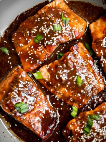 Quick easy teriyaki salmon is tender, flaky, and flavorful, with bold flavors from the delicious teriyaki marinade. Great for dinner or meal prep lunches. | aheadofthyme.com