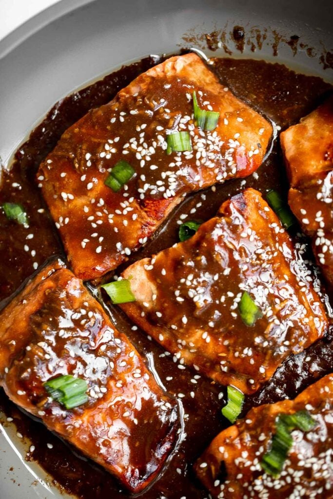 Quick easy teriyaki salmon is tender, flaky, and flavorful, with bold flavors from the delicious teriyaki marinade. Great for dinner or meal prep lunches. | aheadofthyme.com