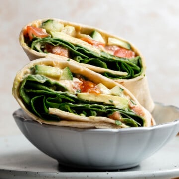 Vegan hummus wrap is a quick easy lunch made in minutes with a handful of fresh ingredients. This delicious veggie wrap is healthy, fresh, nutritious. | aheadofthyme.com