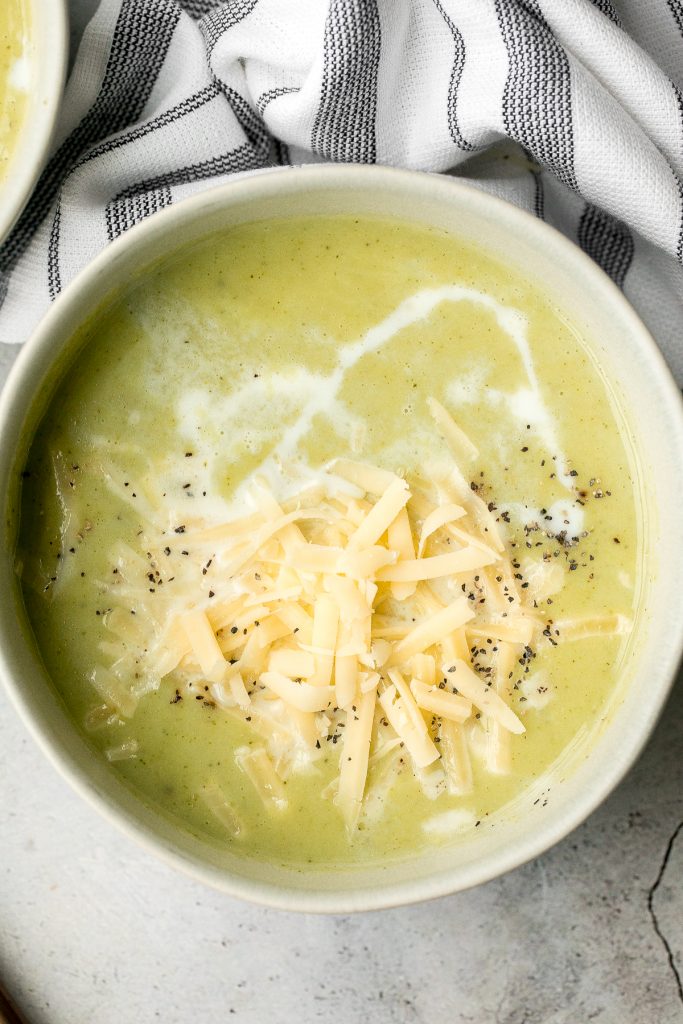 Delicious and flavourful, light cream of broccoli soup is a silky smooth, creamy, and thick soup made healthier with no cream. Make it in under 25 minutes. | aheadofthyme.com