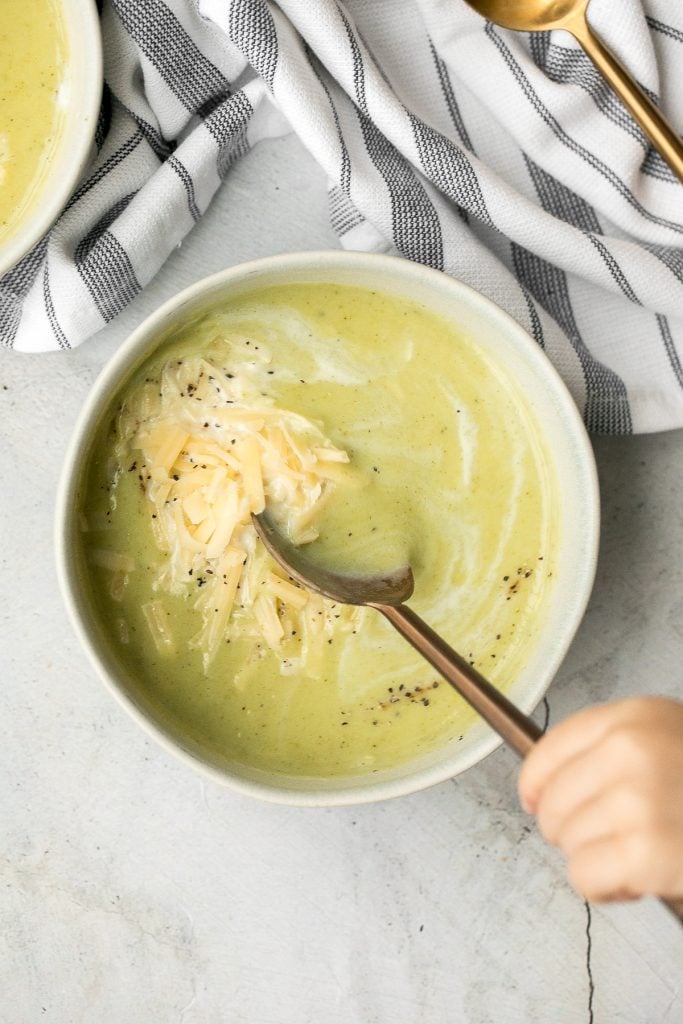 Delicious and flavourful, light cream of broccoli soup is a silky smooth, creamy, and thick soup made healthier with no cream. Make it in under 25 minutes. | aheadofthyme.com