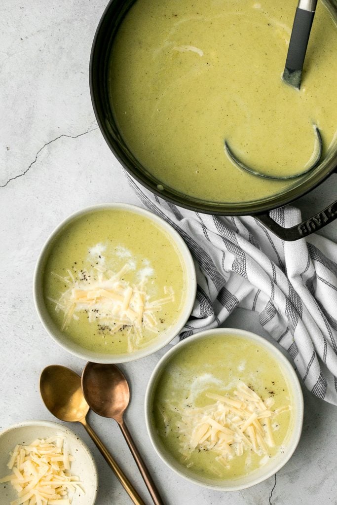 Delicious and flavourful, light cream of broccoli soup is a silky smooth, creamy, and thick soup made healthier with no cream. Make it in under 25 minutes. | aheadofthyme.com