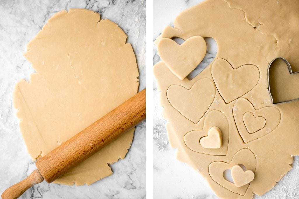 Cute raspberry and white chocolate heart-shaped shortbread cookies literally melt in your mouth. They are the perfect Valentine's Day treat. | aheadofthyme.com