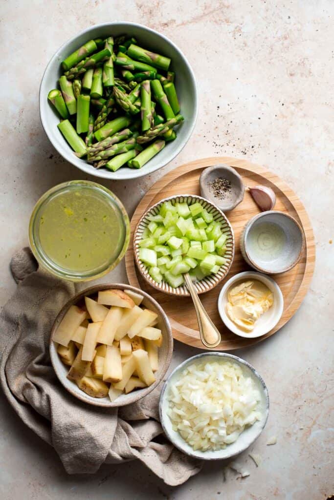 Creamless cream of asparagus soup is healthy, delicious, smooth, creamy, quick and easy to make. A perfect spring soup for a last minute lunch or dinner. | aheadofthyme.com