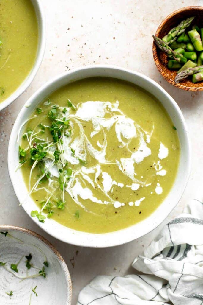 Creamless cream of asparagus soup is healthy, delicious, smooth, creamy, quick and easy to make. A perfect spring soup for a last minute lunch or dinner. | aheadofthyme.com