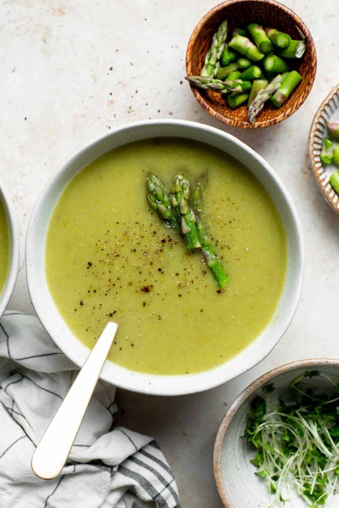 Creamless cream of asparagus soup is healthy, delicious, smooth, creamy, quick and easy to make. A perfect spring soup for a last minute lunch or dinner. | aheadofthyme.com