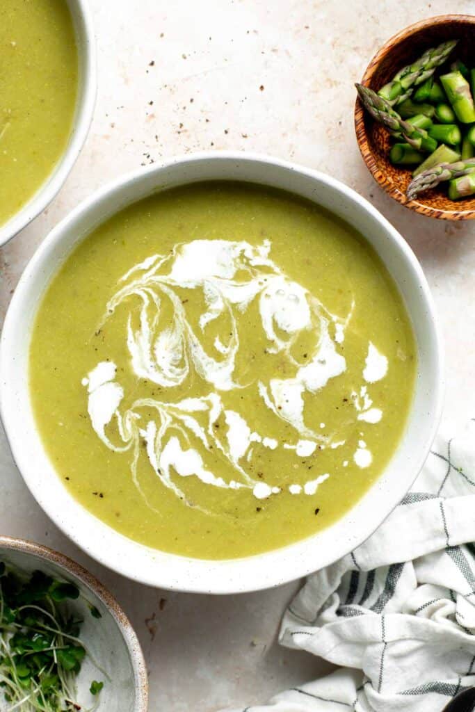 Creamless cream of asparagus soup is healthy, delicious, smooth, creamy, quick and easy to make. A perfect spring soup for a last minute lunch or dinner. | aheadofthyme.com