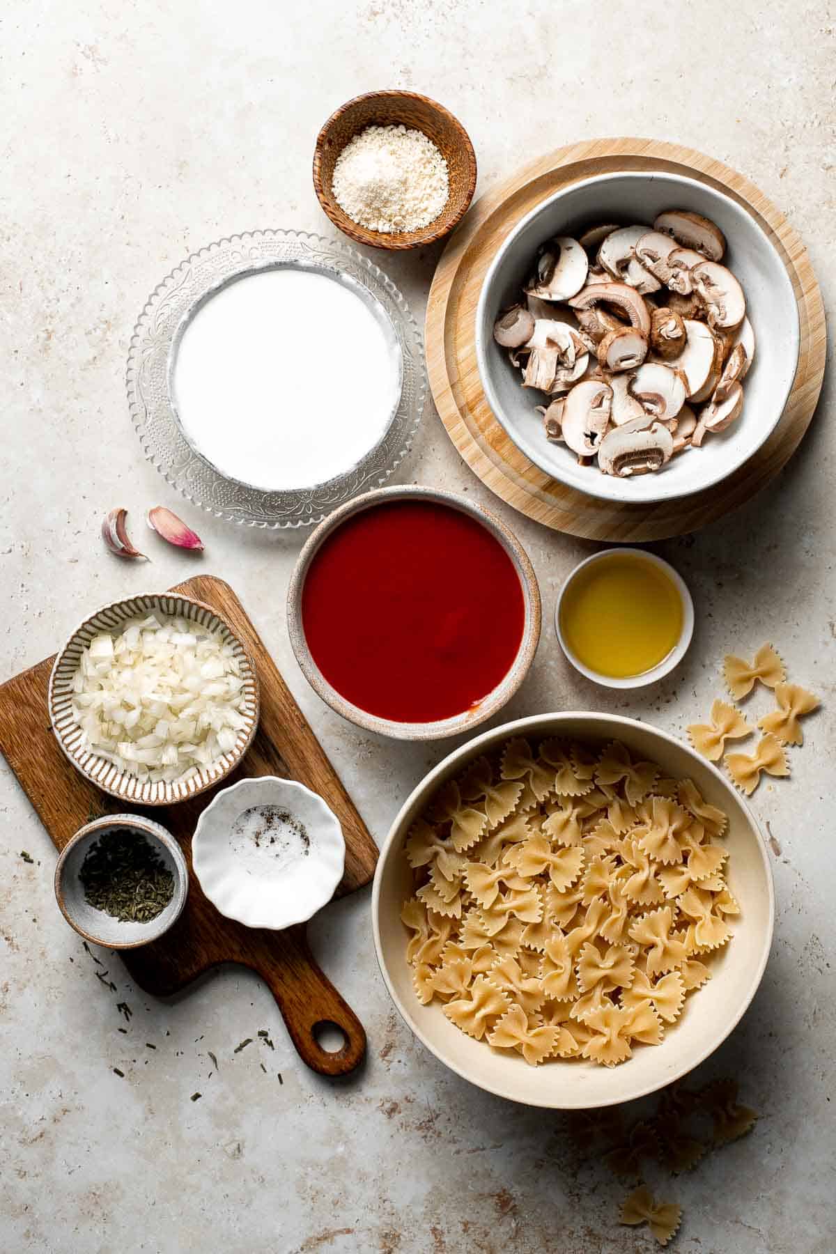 Farfalle pasta with mushroom rose sauce is creamy yet light, delicious and flavorful, and quick and easy to make in 20 minutes. Best comfort food dinner! | aheadofthyme.com