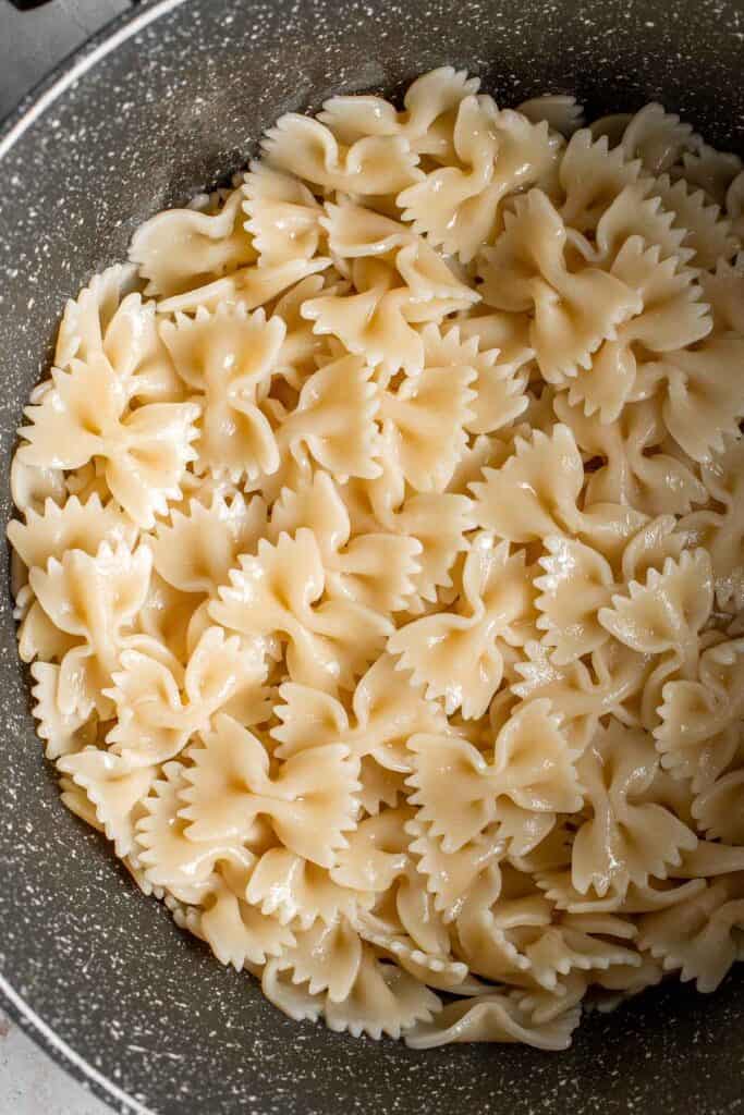 Farfalle pasta with mushroom rose sauce is creamy yet light, delicious and flavorful, and quick and easy to make in 20 minutes. Best comfort food dinner! | aheadofthyme.com