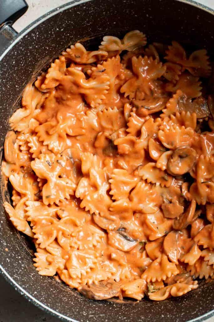 Farfalle pasta with mushroom rose sauce is creamy yet light, delicious and flavorful, and quick and easy to make in 20 minutes. Best comfort food dinner! | aheadofthyme.com