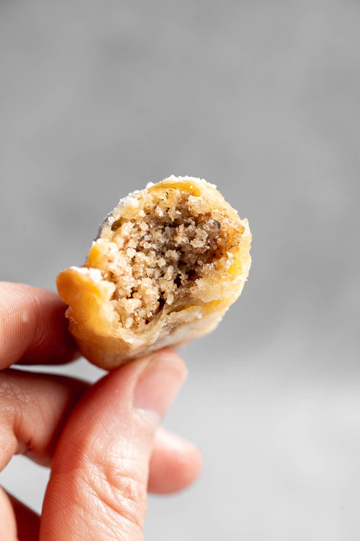 Ghotab (or Qottab) are traditional Persian walnut-filled crescent pastries that are delicate and crisp outside with a spiced, nutty filling inside. | aheadofthyme.com