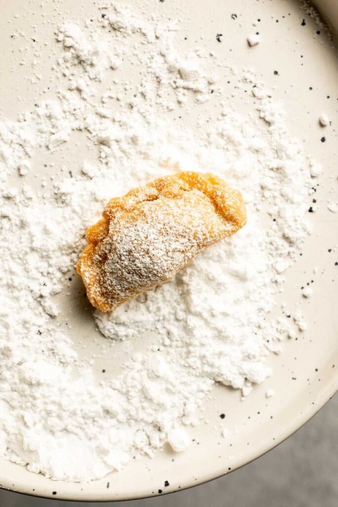 Ghotab (or Qottab) are traditional Persian walnut-filled crescent pastries that are delicate and crisp outside with a spiced, nutty filling inside. | aheadofthyme.com