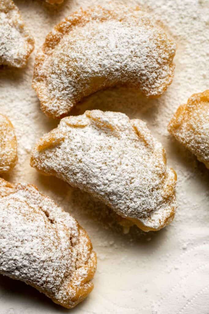 Ghotab (or Qottab) are traditional Persian walnut-filled crescent pastries that are delicate and crisp outside with a spiced, nutty filling inside. | aheadofthyme.com