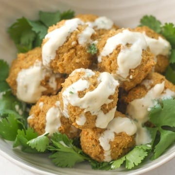 Quinoa, Cauliflower and Chickpea Vegetarian Meatballs with Tahini Sauce: Vegetarian meatballs are easy to make with a combination of quinoa, cauliflower, chickpeas and an assortment of spices and herbs, drizzled with a homemade tahini sauce | aheadofthyme.com