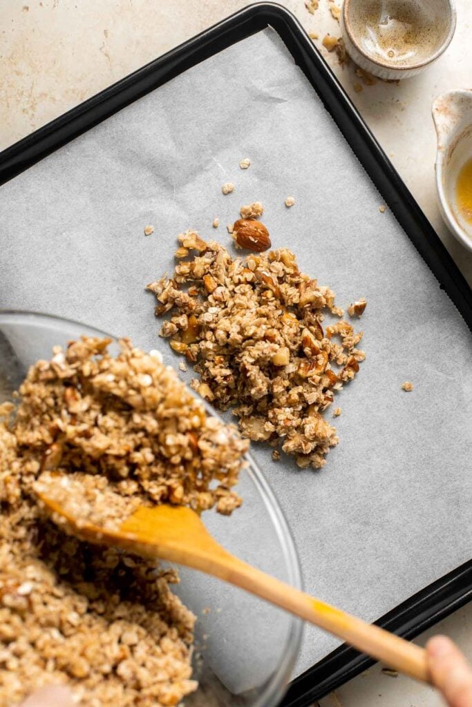 Coconut Maple Walnut Granola is easy to make from scratch with simple ingredients including 3 types of nuts. It's gluten-free, vegan and refined sugar-free! | aheadofthyme.com