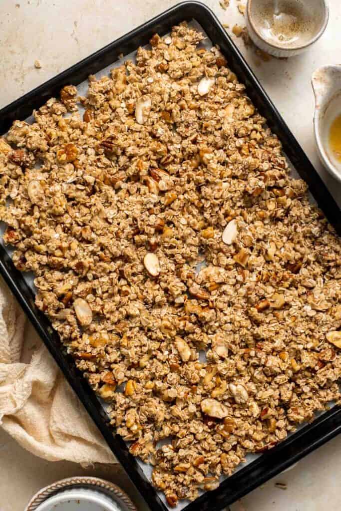 Coconut Maple Walnut Granola is easy to make from scratch with simple ingredients including 3 types of nuts. It's gluten-free, vegan and refined sugar-free! | aheadofthyme.com