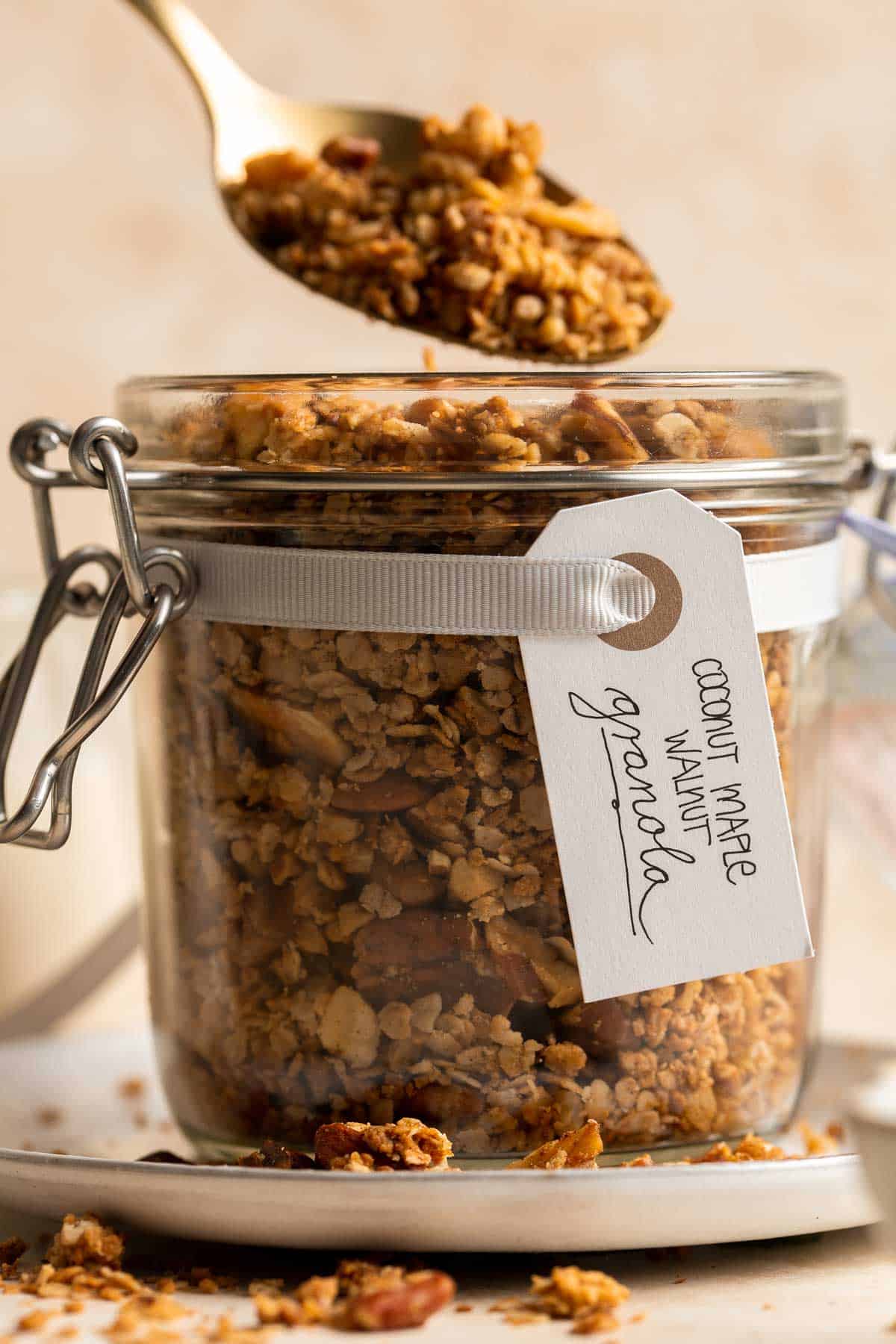 Coconut Maple Walnut Granola is easy to make from scratch with simple ingredients including 3 types of nuts. It's gluten-free, vegan and refined sugar-free! | aheadofthyme.com