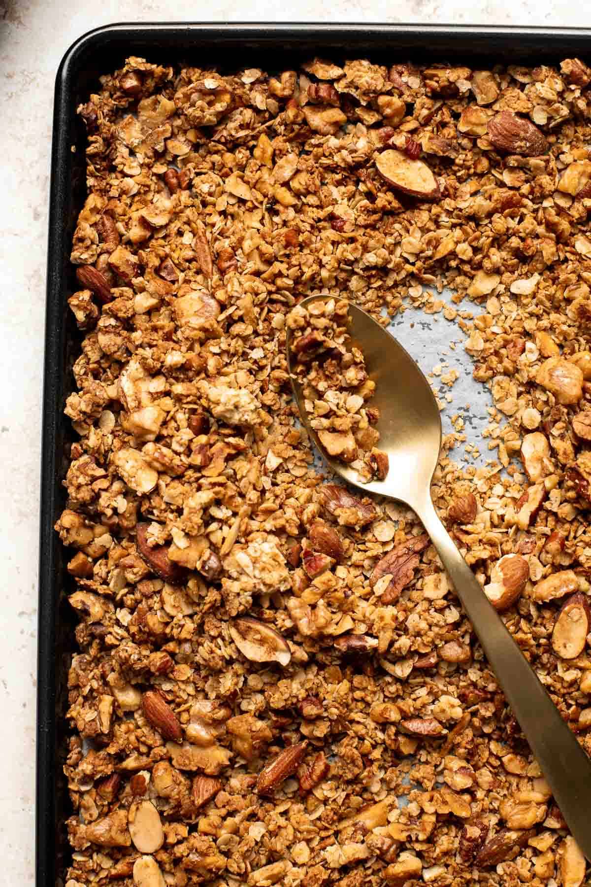 Coconut Maple Walnut Granola is easy to make from scratch with simple ingredients including 3 types of nuts. It's gluten-free, vegan and refined sugar-free! | aheadofthyme.com