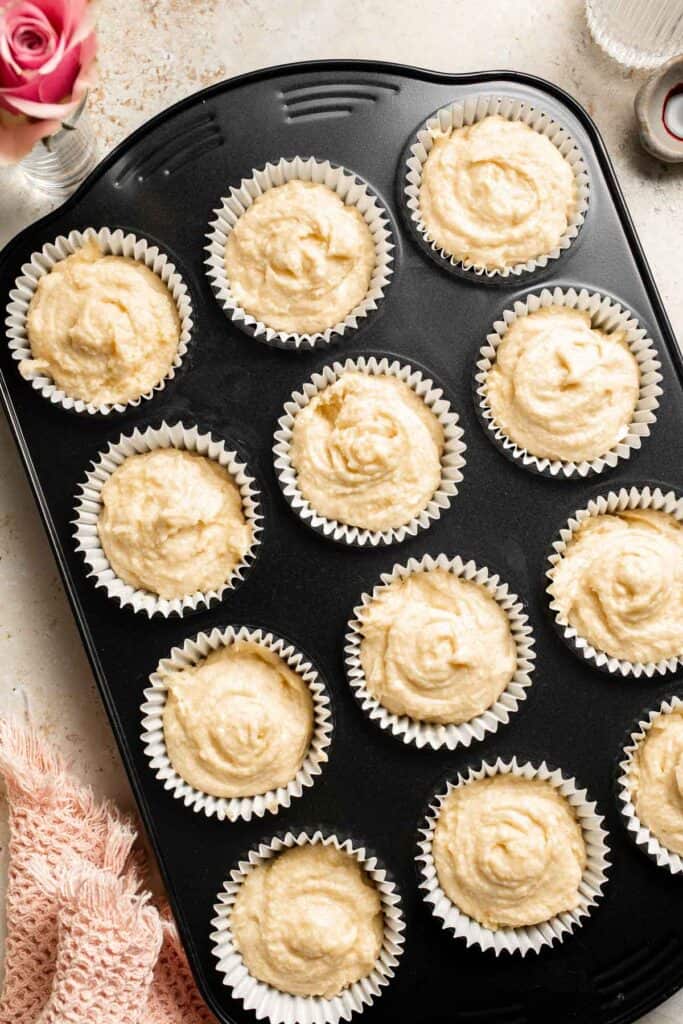 This Mother’s Day, treat someone special (or yourself!) to these beautifully light, airy, and fluffy Vanilla Cupcakes with Rose Petal Buttercream. | aheadofthyme.com