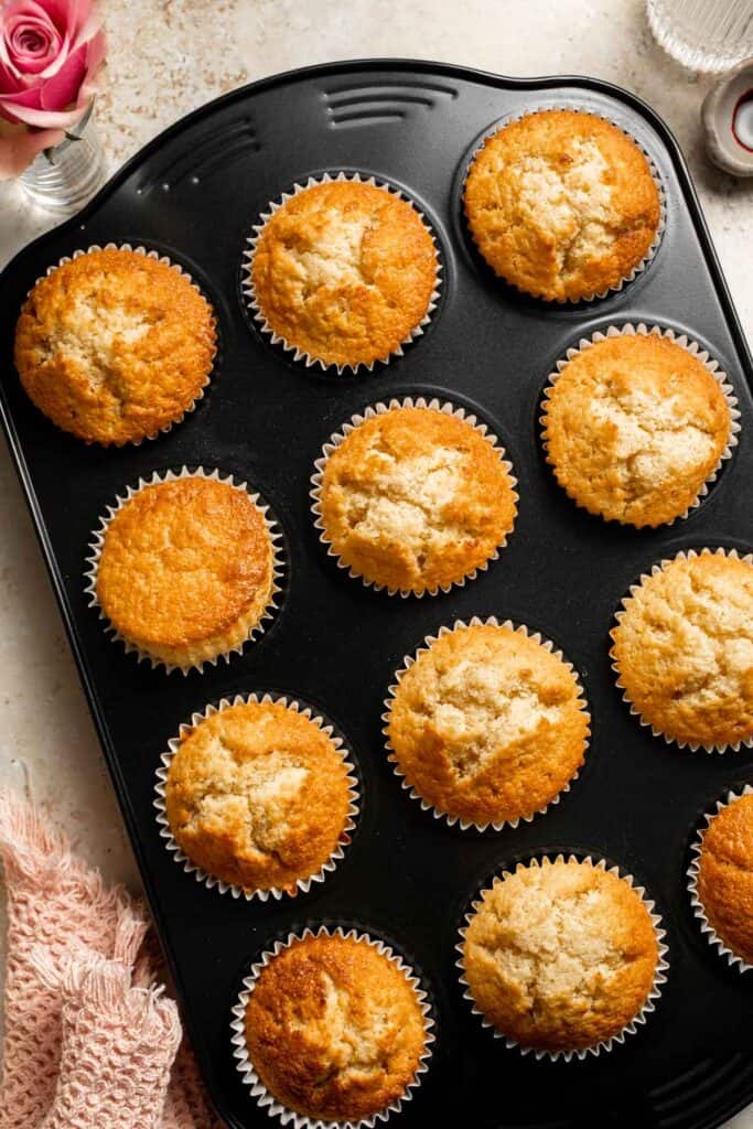 This Mother’s Day, treat someone special (or yourself!) to these beautifully light, airy, and fluffy Vanilla Cupcakes with Rose Petal Buttercream. | aheadofthyme.com