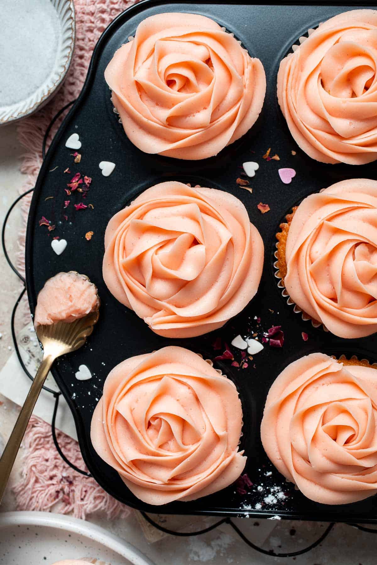 This Mother’s Day, treat someone special (or yourself!) to these beautifully light, airy, and fluffy Vanilla Cupcakes with Rose Petal Buttercream. | aheadofthyme.com